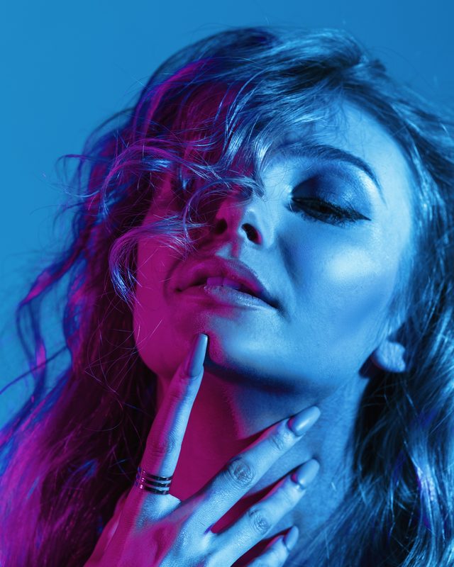 Fashion portrait lit with coloured gels