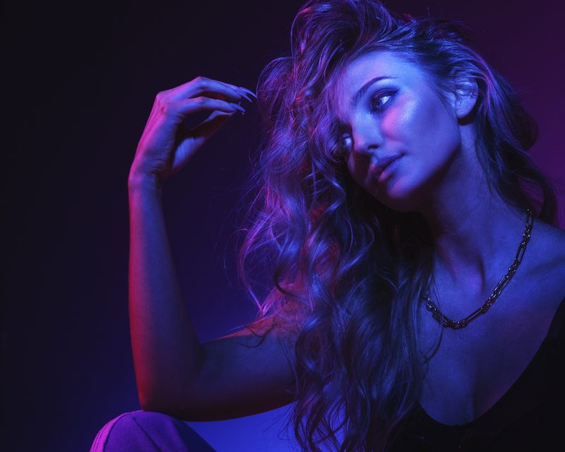 Fashion portrait lit with coloured gels